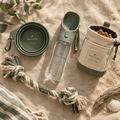 The Weekend Away Kit — dog travel essentials flat lay on sandy linen