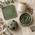 The Enrichment Box — dog enrichment products flat lay on cream linen