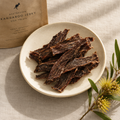 Single-Protein Kangaroo Treats — grain-free Australian dog treats on cream ceramic plate